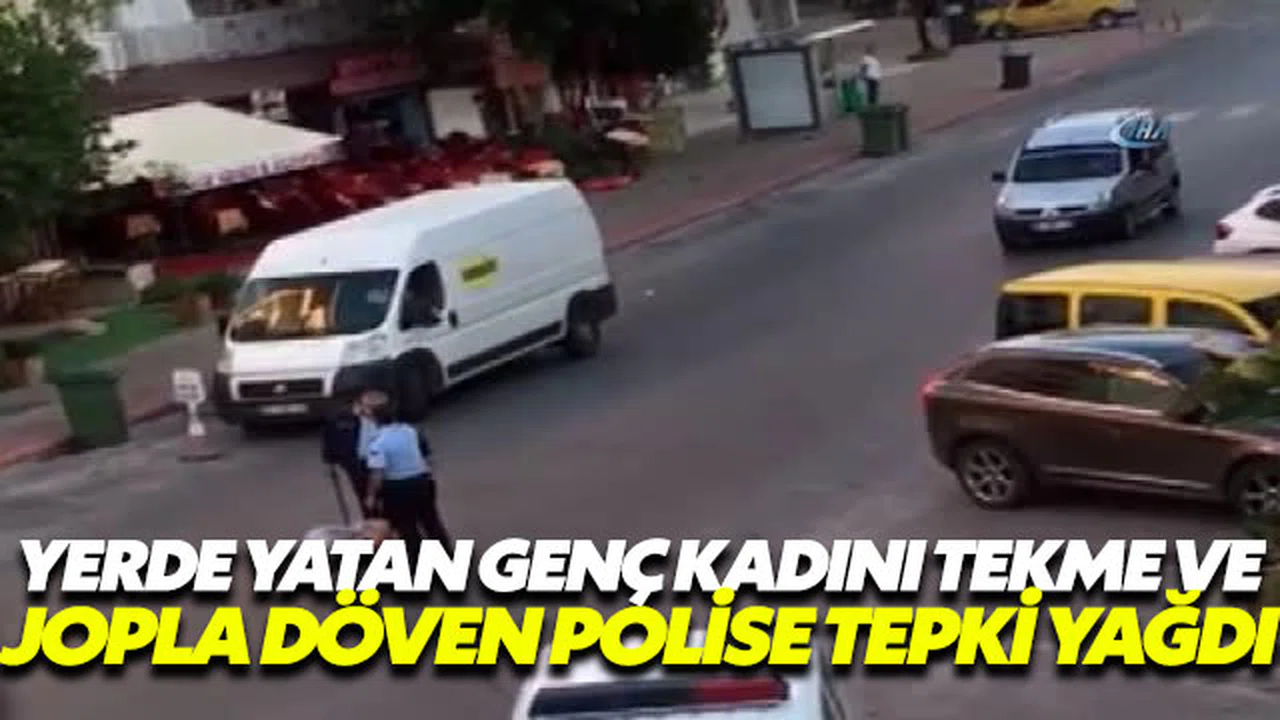 Polis yerde yatan kadını tekmeledi
