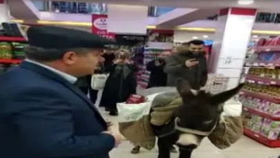Markete eşekle girdi poşet parası vermedi