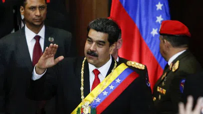 Maduro: 'Ellerini Venezuela'dan çek'